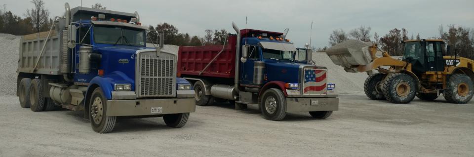 Dump Trucks getting loaded with Limestone